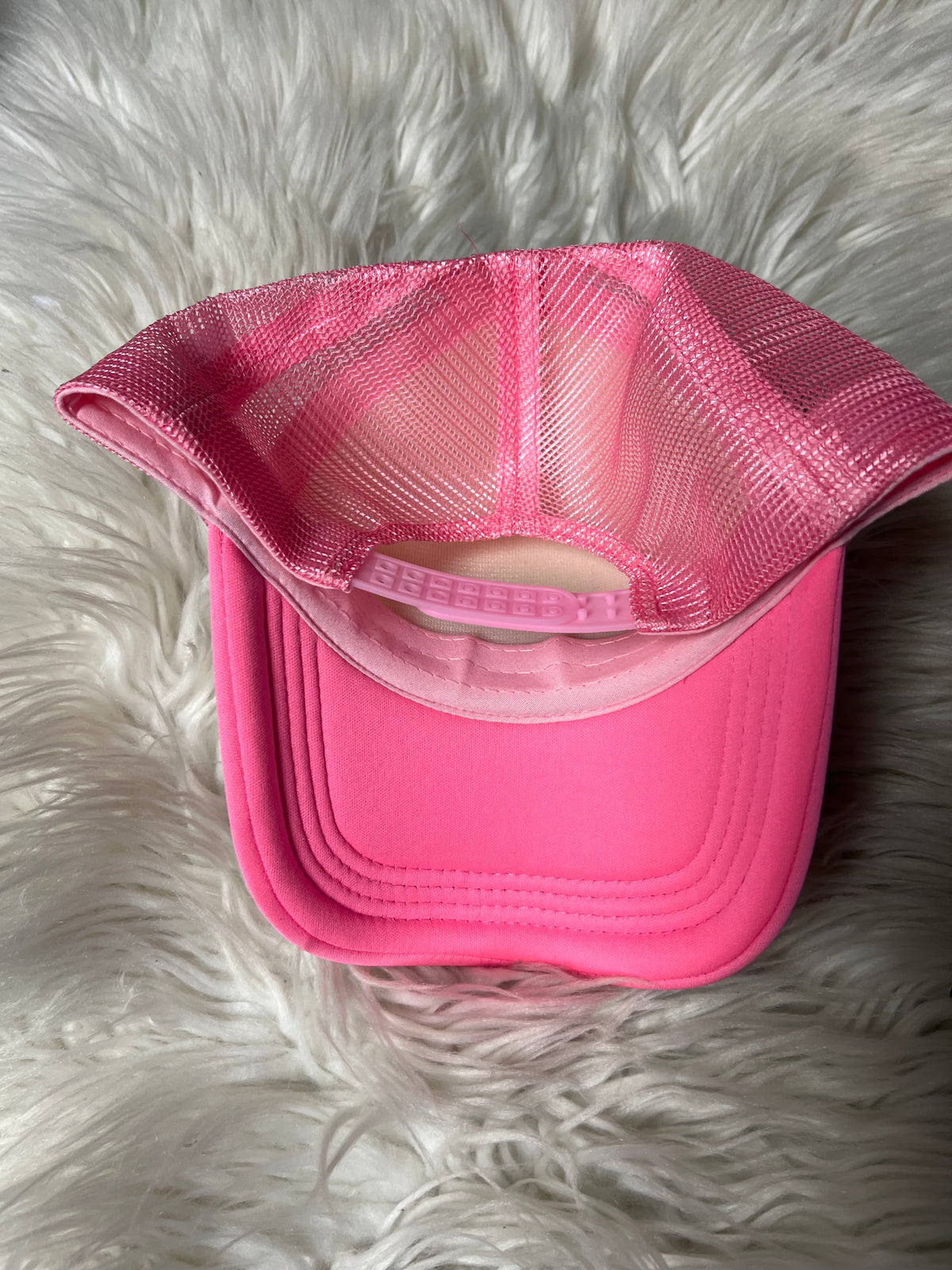 New hat pink I know how many licks it takes 