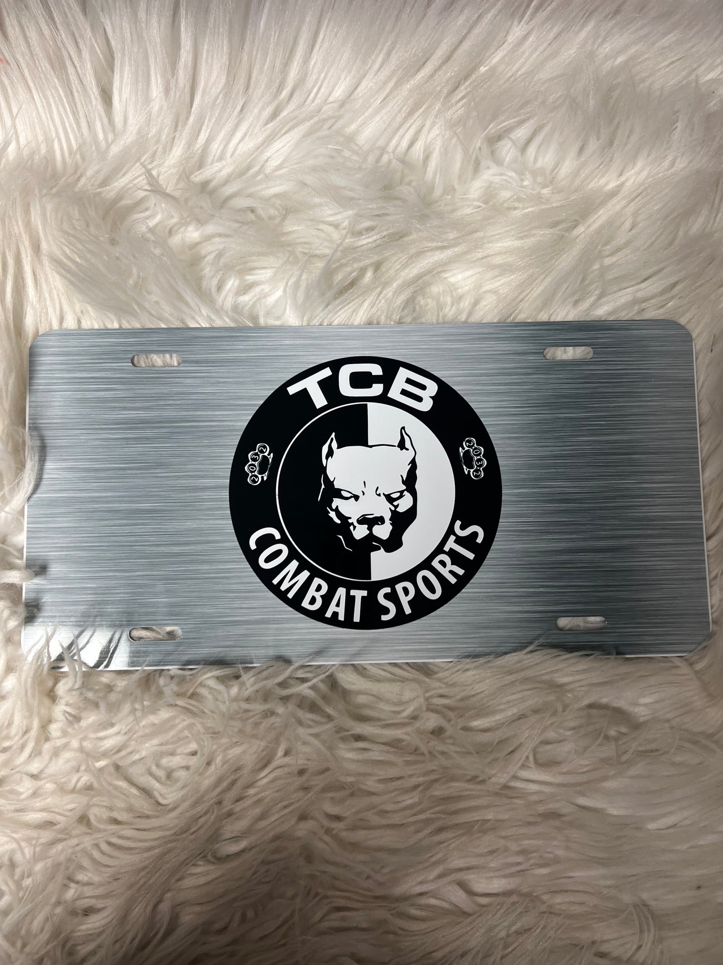 TCB vanity plate