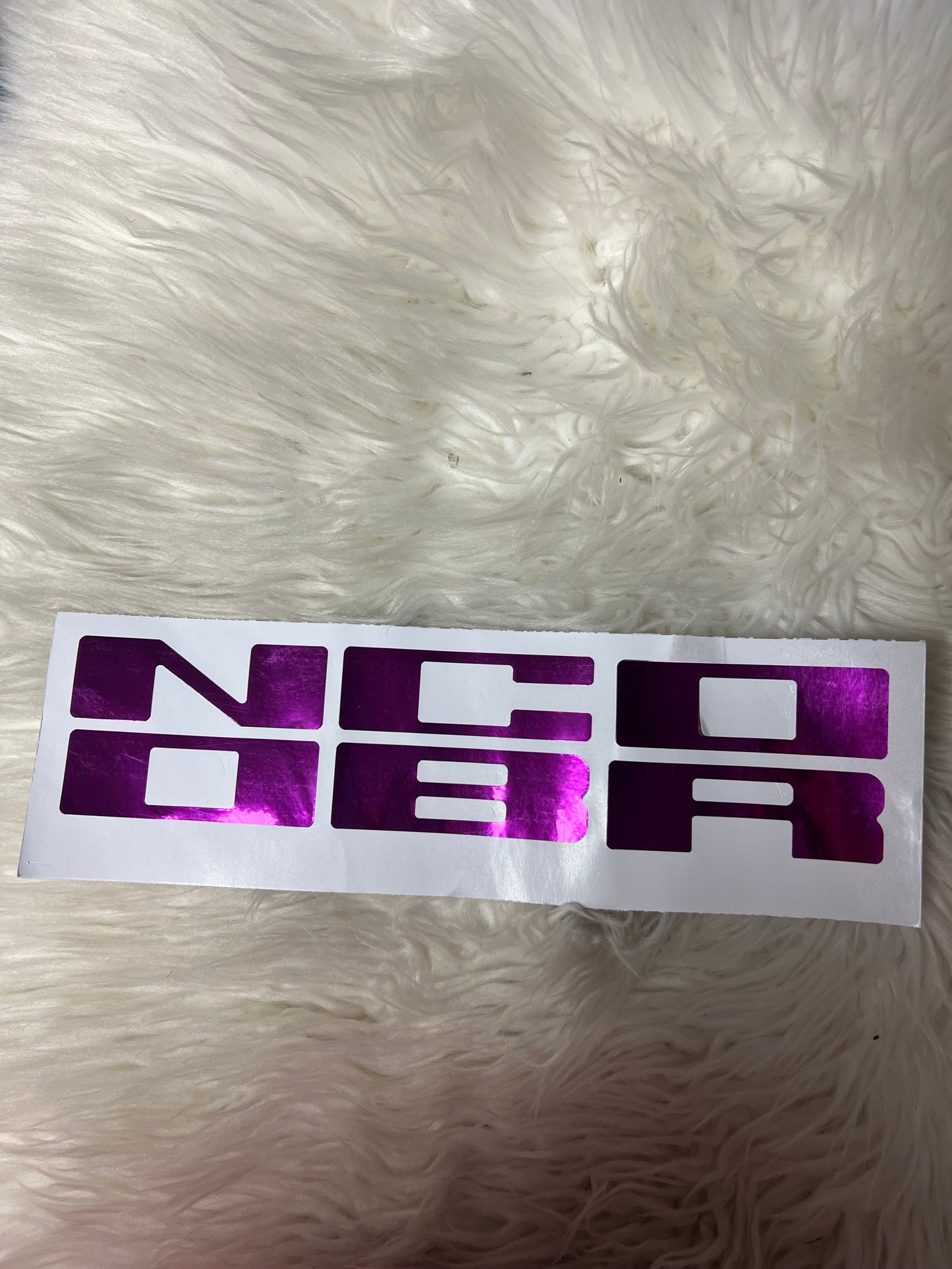 New car decals the letters on the grill