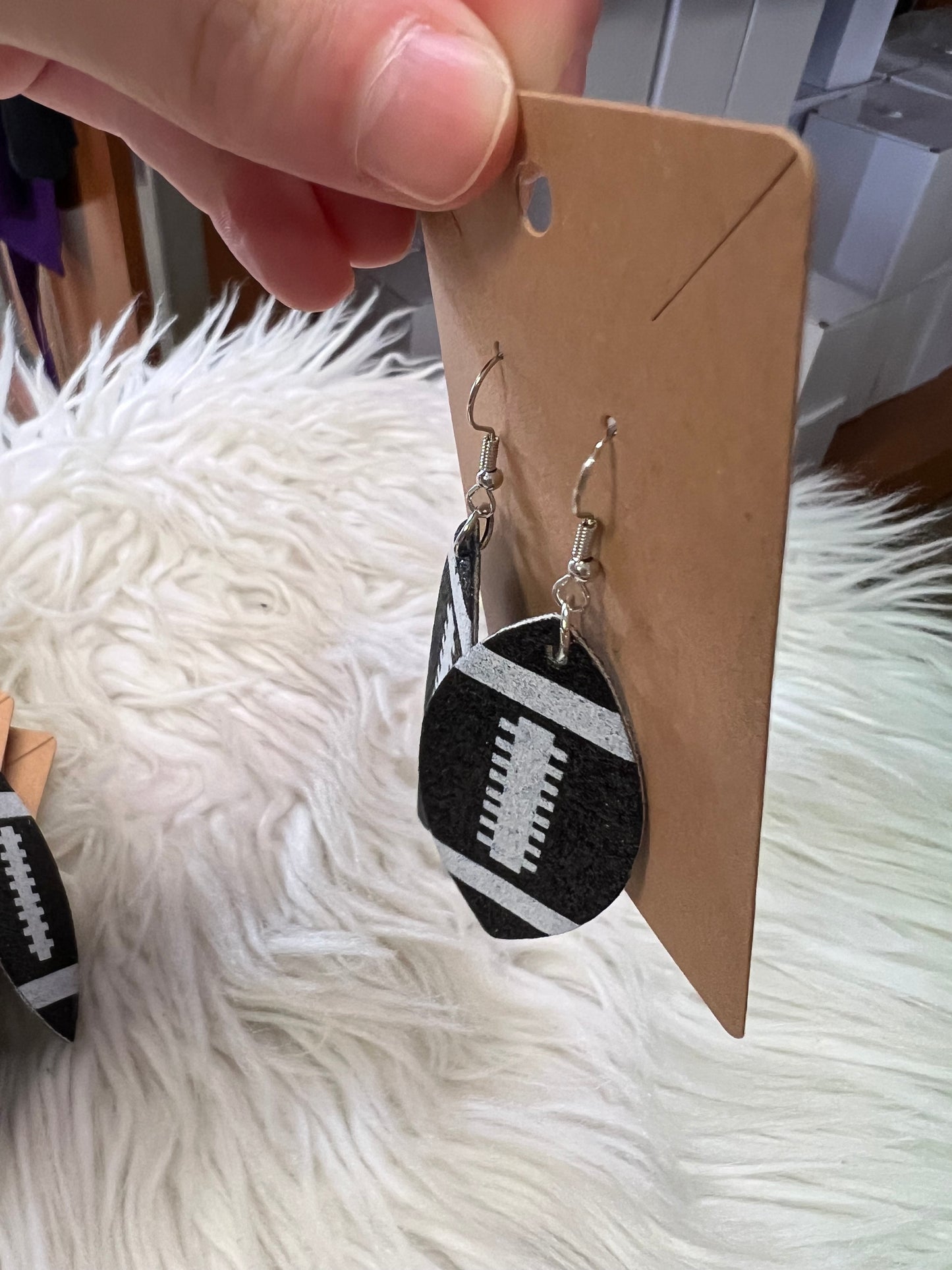 New glitter, faux, leather football earrings black