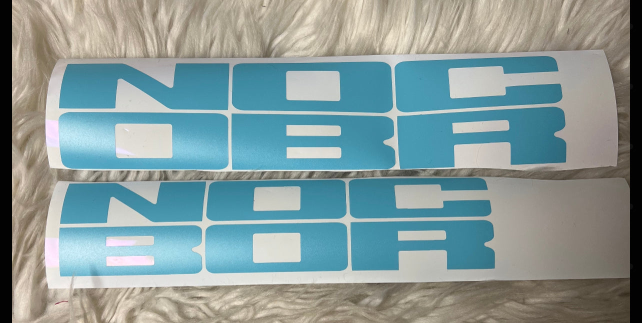 New car decals the letters on the grill