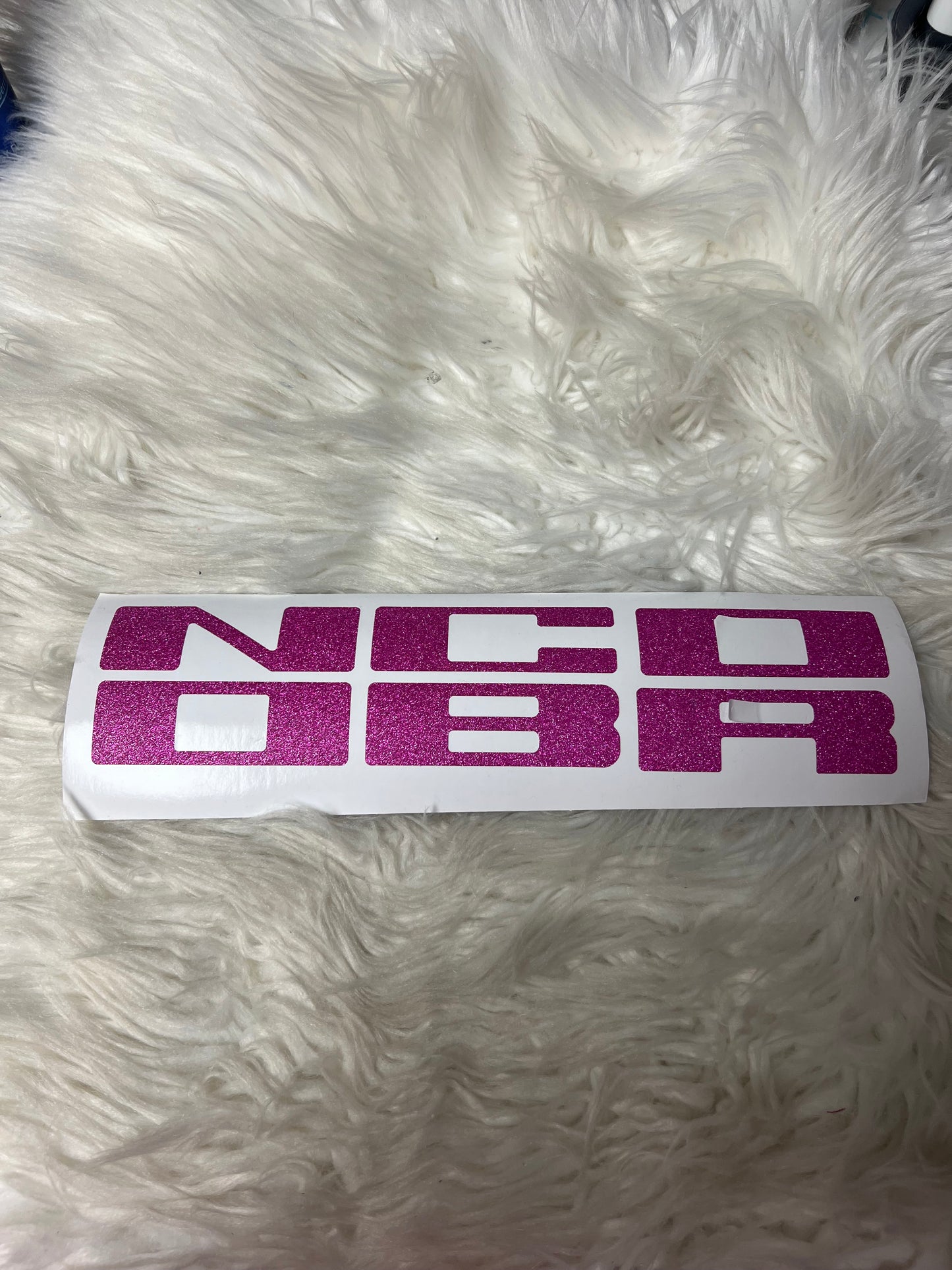 New car decals the letters on the grill