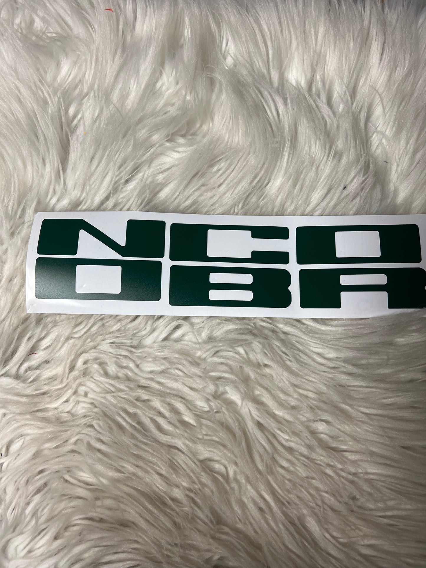 New car decals the letters on the grill