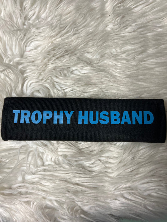 New seatbelt covers trophy husband