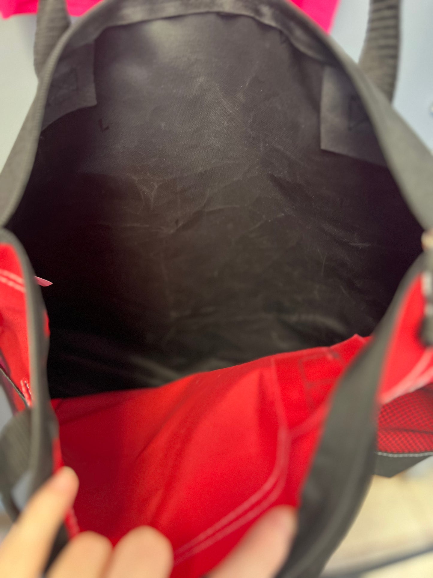 New red tote messy bun of football