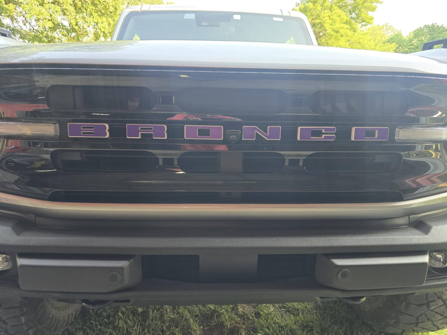 New car decals the letters on the grill