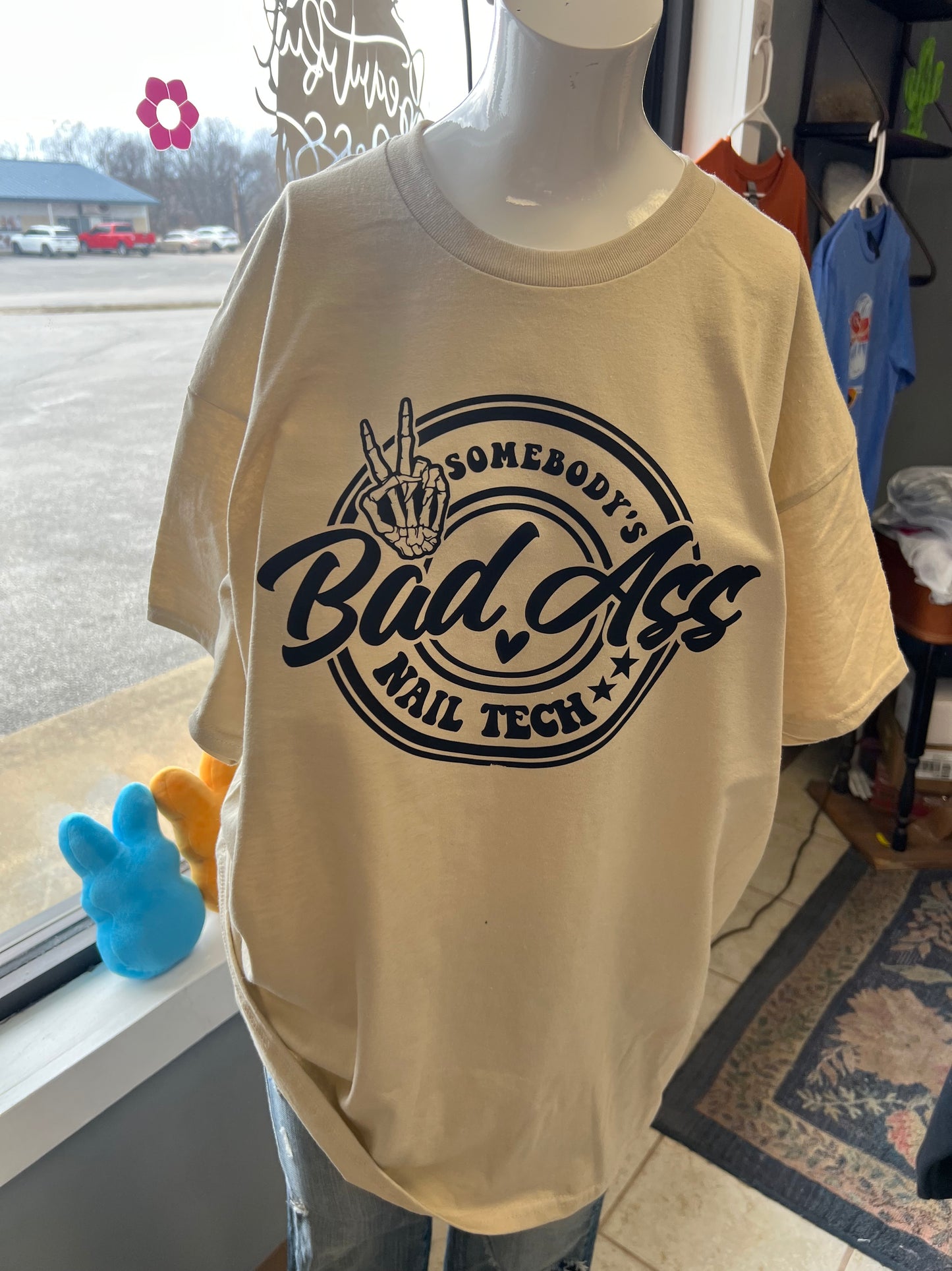 Somebody is bomb ass nail tech unisex tan  T-shirt