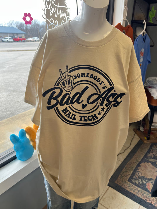 Somebody is bomb ass nail tech unisex tan  T-shirt