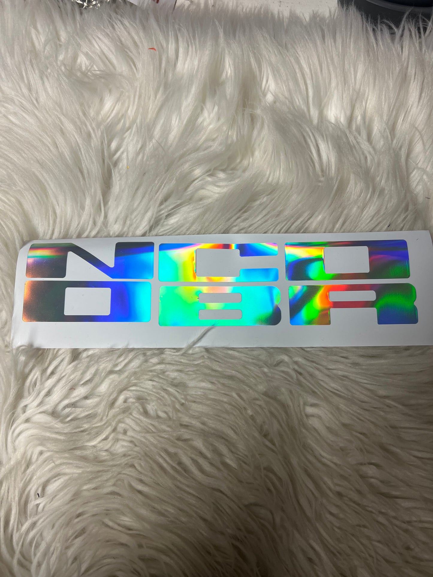 New car decals the letters on the grill