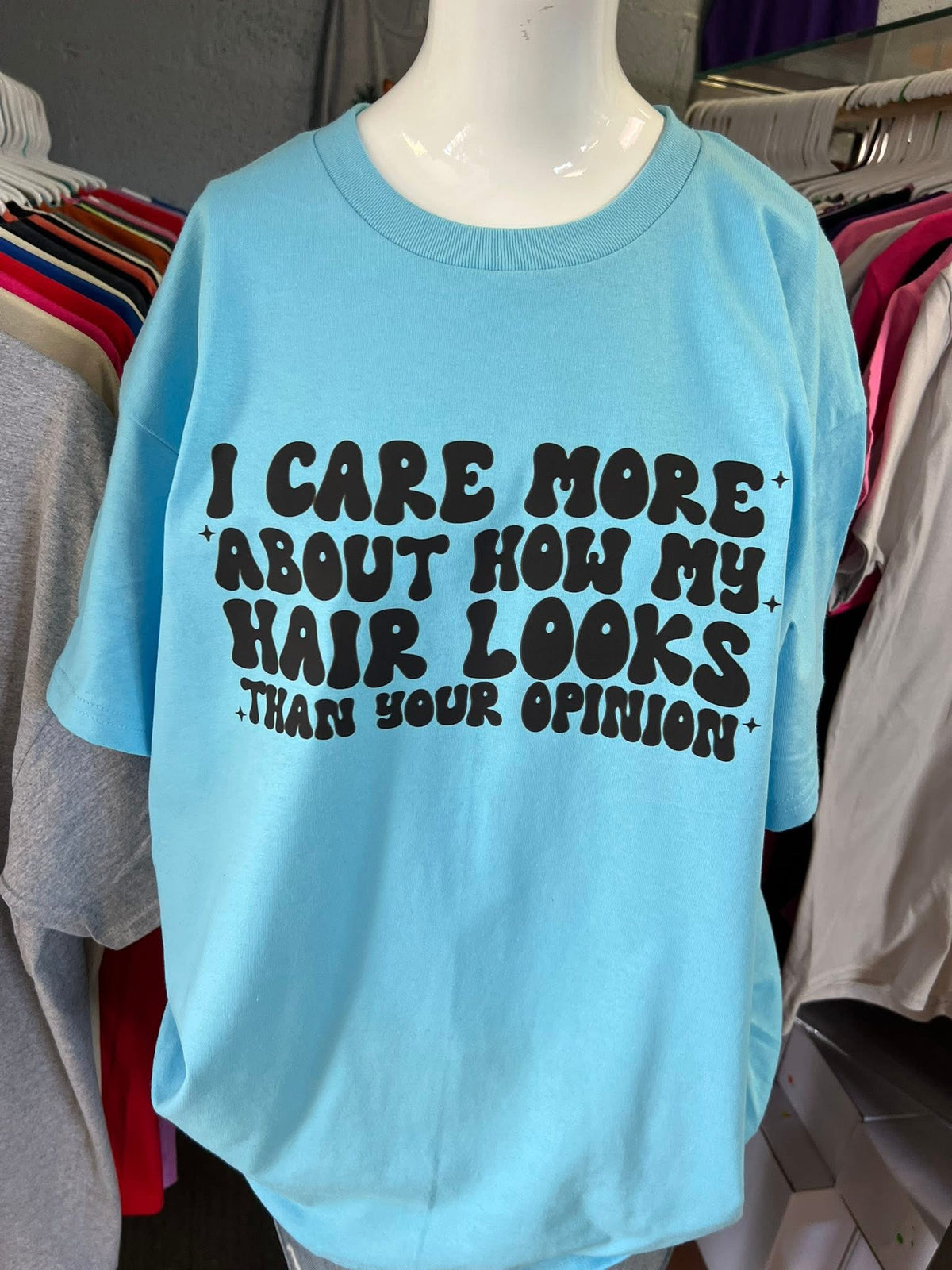 Unisex new T-shirt light blue I care more about how my hair works than your opinion 