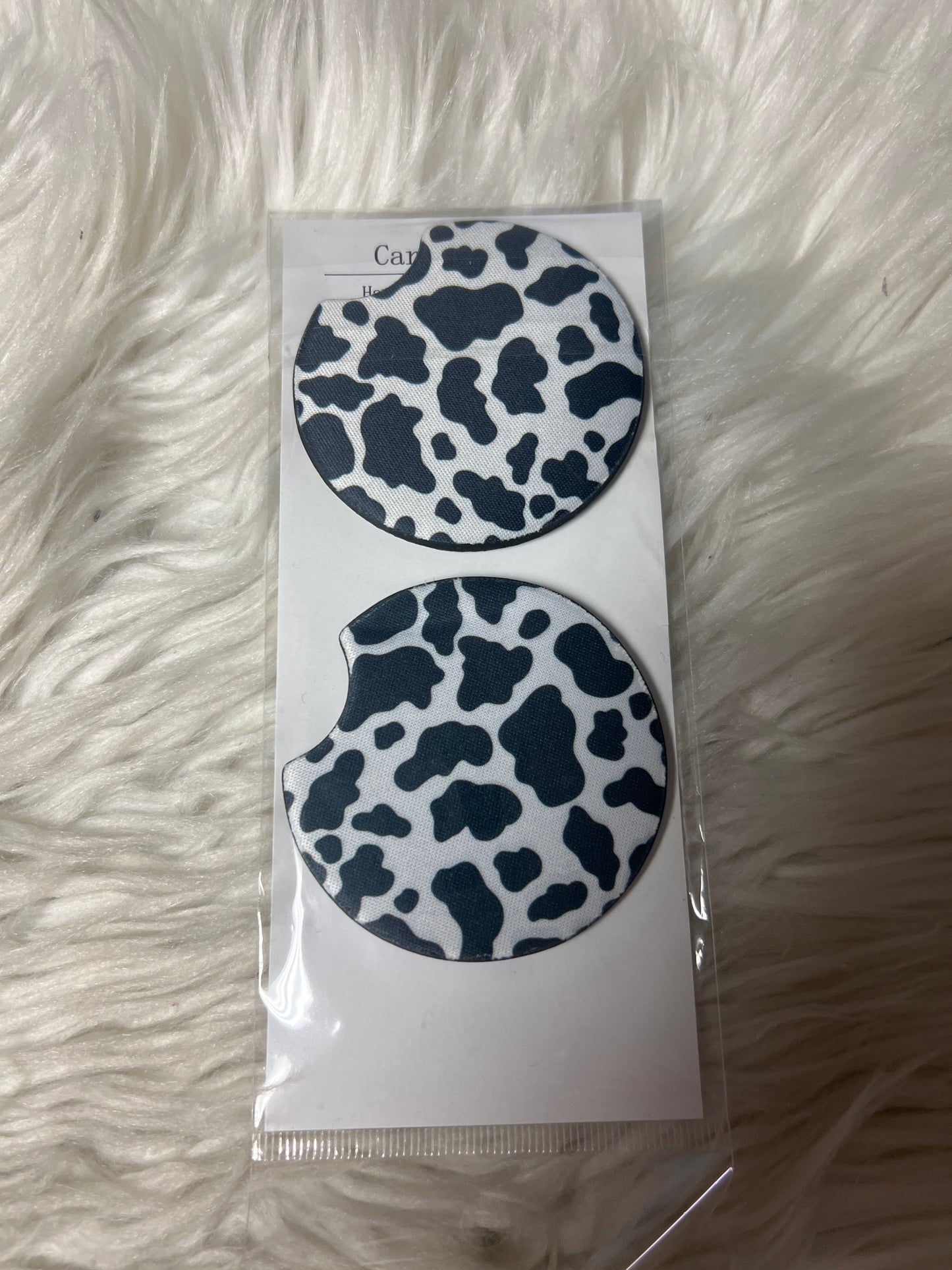 Cow print car coasters
