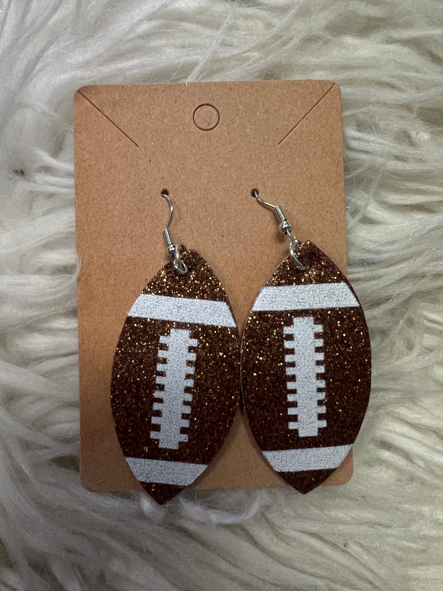 New glitter, faux, leather football earrings