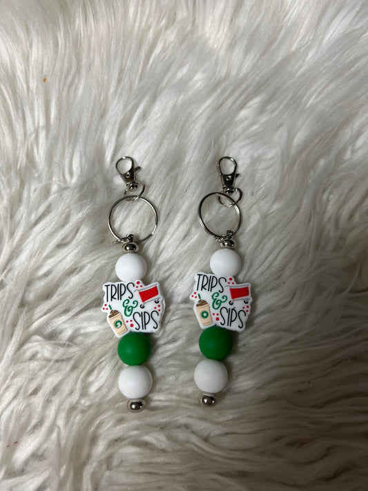 New keychain trips and sips coffee