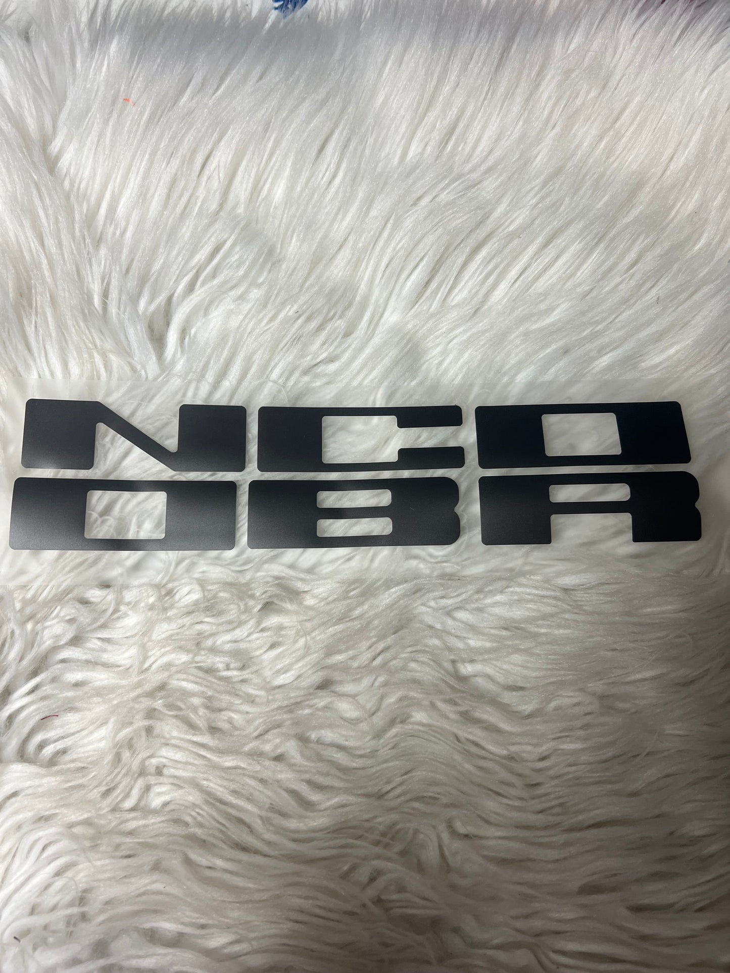 New car decals the letters on the grill