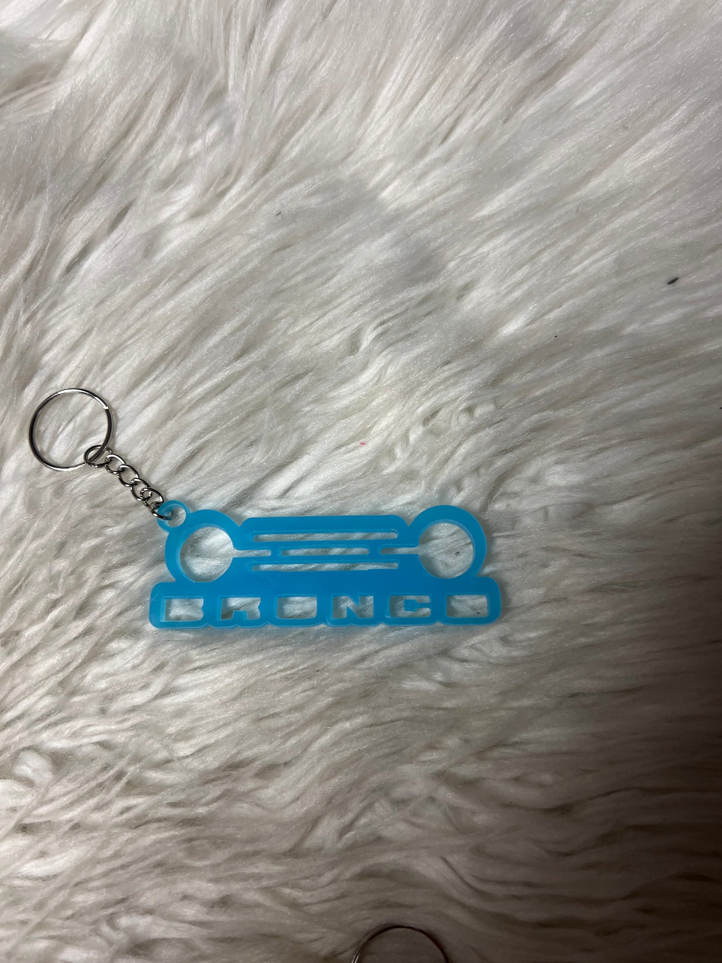 New 4 x 4 keychain blue glow  in the dark
