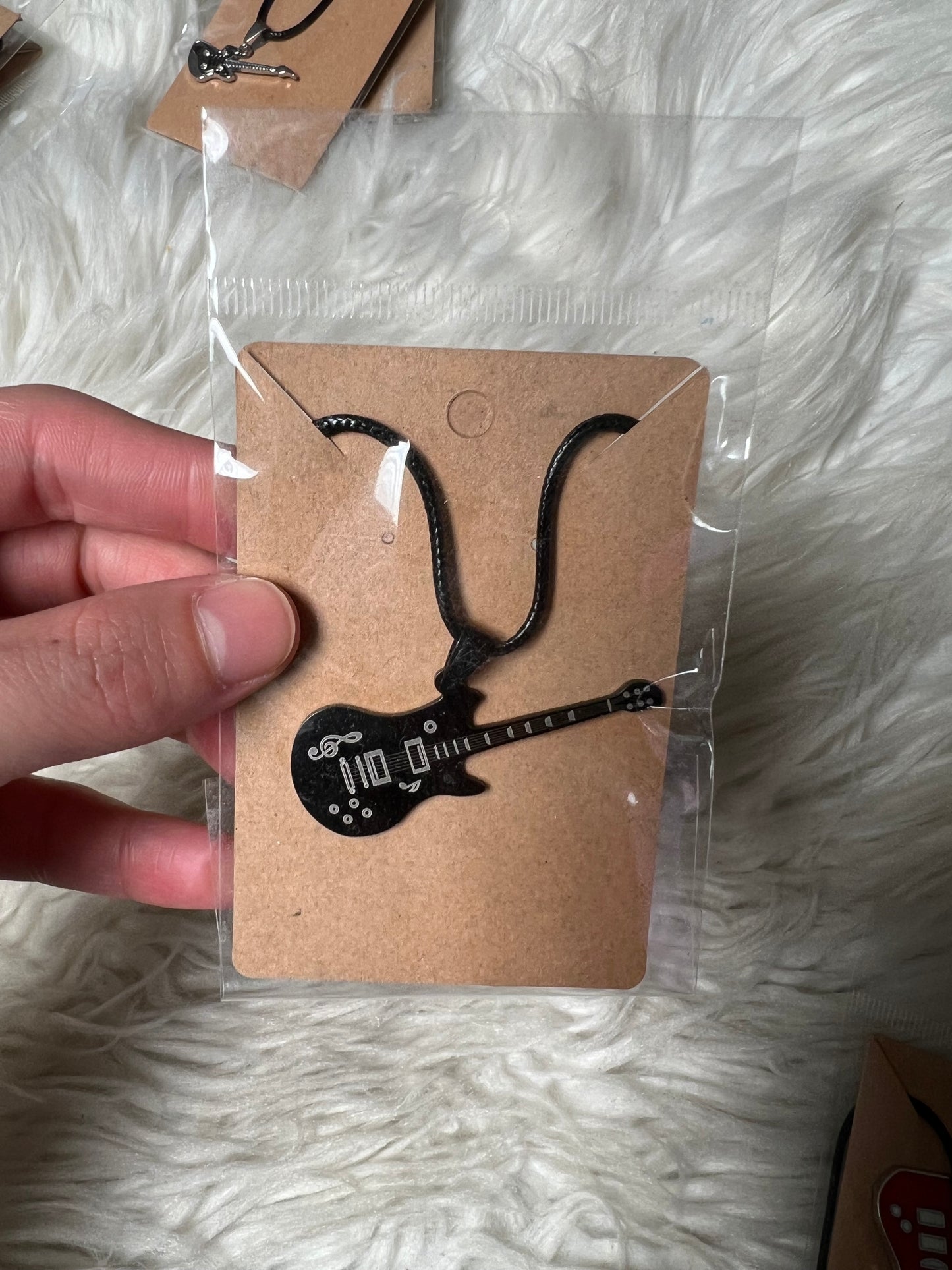 Brand new necklace guitar