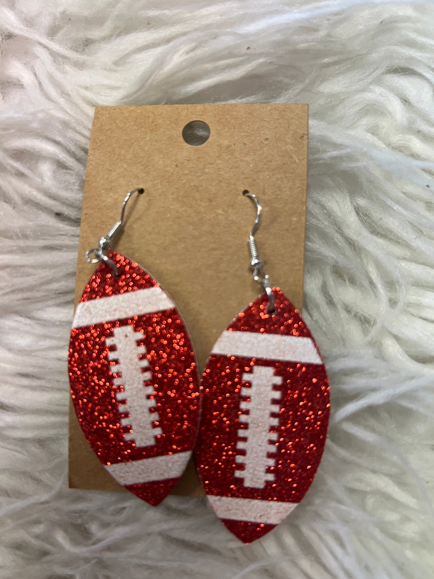 New glitter, faux, leather football earrings red