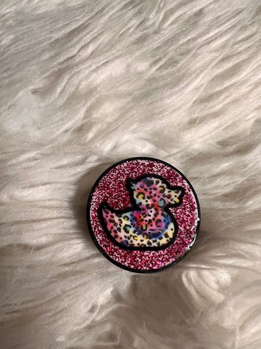 Resin covered pop socket