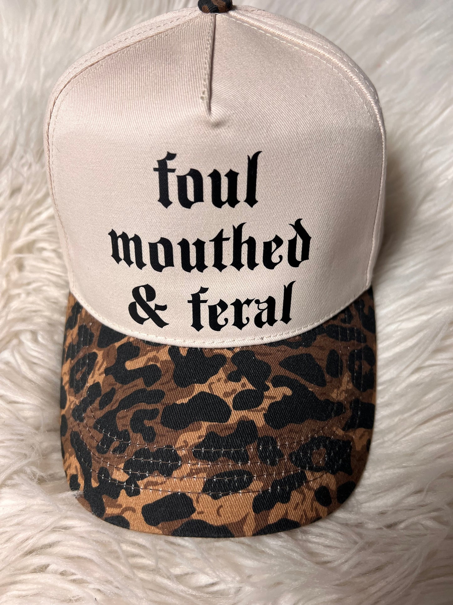 New hat leopard foul mouthed and feral ￼