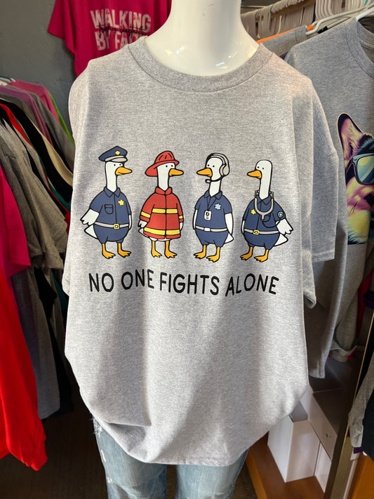 New  unisex T-shirt no one fights alone firefighter police dispatcher, emt ￼