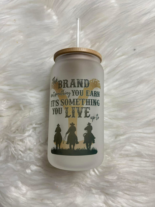 Brand new 16 ounce glass cup with straw